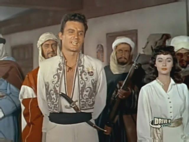 Кадр из фильма Пески пустыни / Desert Sands (1955)