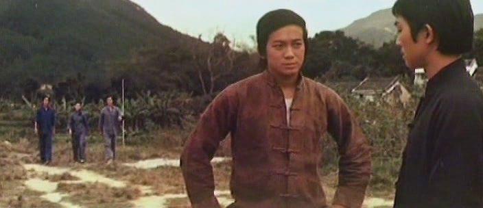 Кадр из фильма Парень суперкунгфуист / Xiao ba wang (1973)