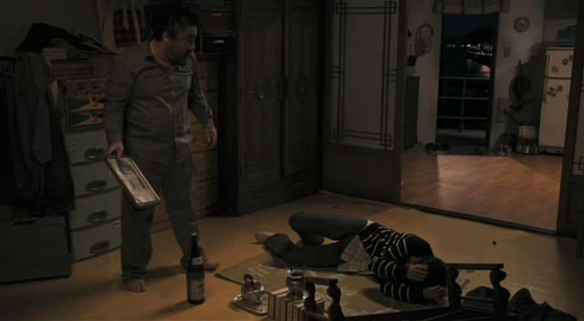 Кадр из фильма Город отцов / Boo-san (2009)