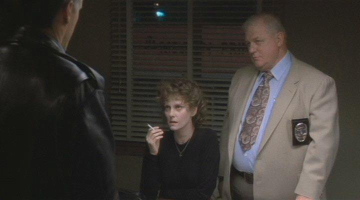 Кадр из фильма Полицейский / Cop (1988)