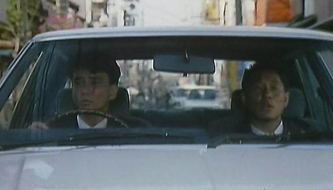 Кадр из фильма Жестокий полицейский / Sono otoko, kyôbô ni tsuki (1989)