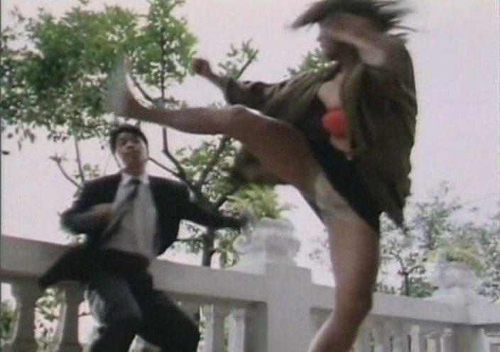 Кадр из фильма Куклы-убийцы / Jing tian long hu bao (1990)