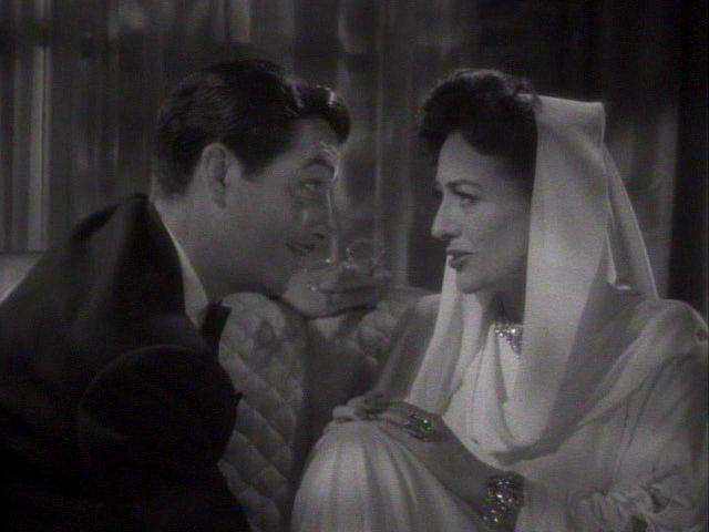 Кадр из фильма Когда встречаются леди / When Ladies Meet (1941)