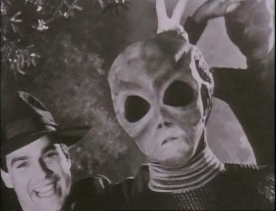 Кадр из фильма Там / Out There (1995)